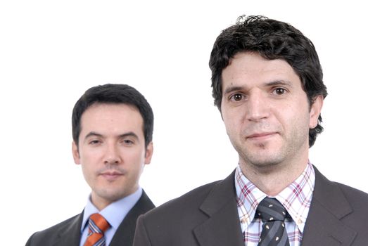 two young business men portrait on white. focus on the right man