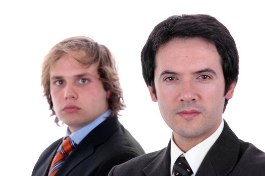 two young business men portrait on white. focus on the right man