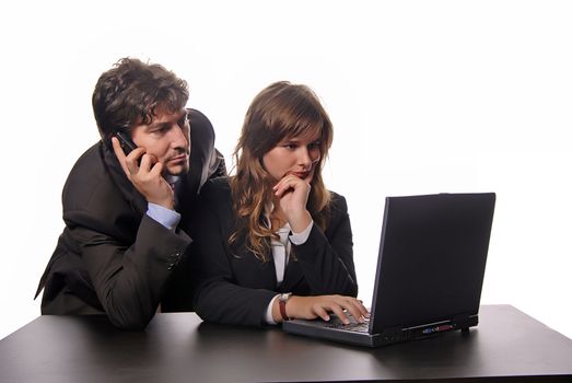 young business couple working with her laptop