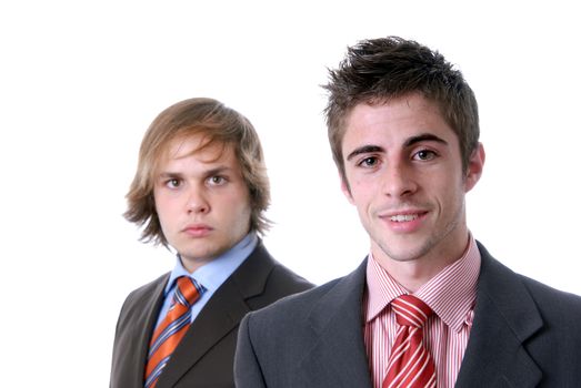 two young business men portrait on white. focus on the right man