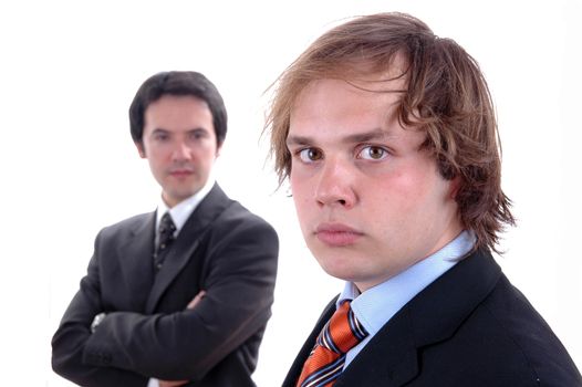 two young business men portrait on white. focus on the right man