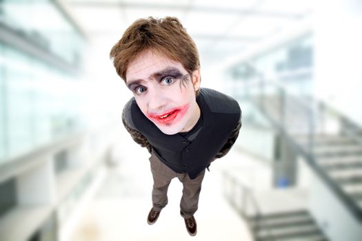 crazy young man dressed as joker