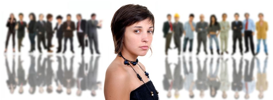 young casual woman portrait with some people in the back