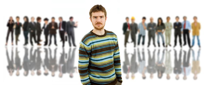 an young man in front of a group of people