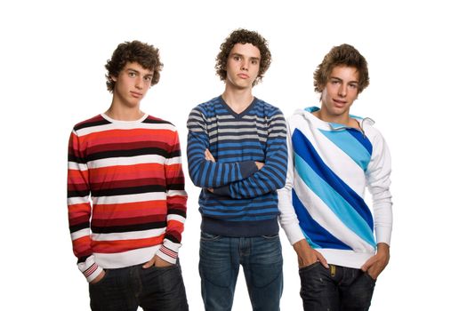 three young men standing, on a white background