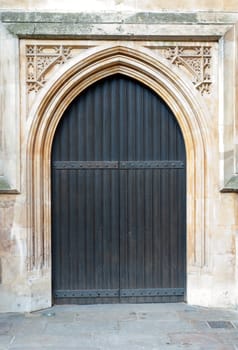 Old massive church door of the catholic church