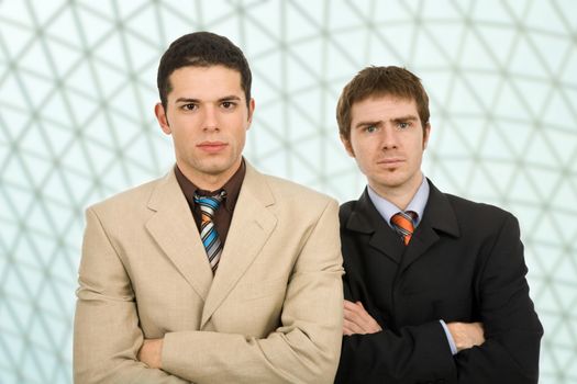 two young business men portrait at the office