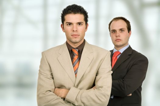 two young business men portrait at the office