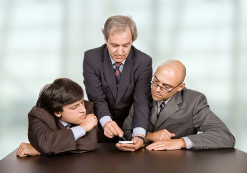 group of workers on a desk at the office