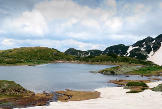 high mountain with lake