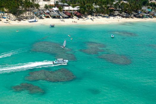 Boats and beach from above. Dominican Republic.