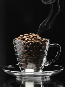 coffee beans in the glassy cup
