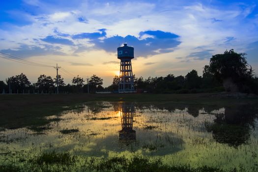 Water Tower near Siem Reap International Airport at Sunset. Cambodia. 