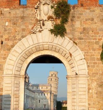 Leaning Tower of Pisa, Italy and arch of the Cathedral