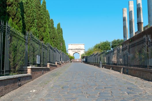 View from street with arch in Rome, Italy