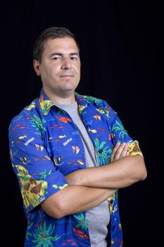 young casual man portrait on a black background