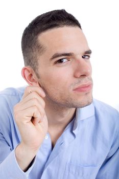 pensive young casual man portrait, isolated on white