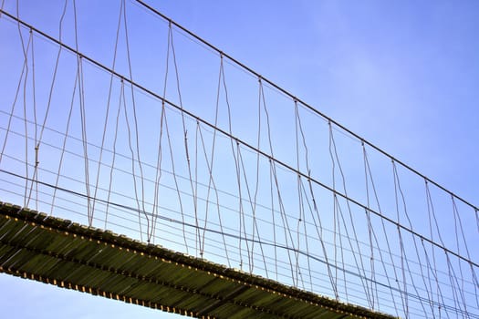 Rope bridge and sky in park