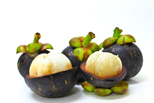 tropical mangosteen fruit on white background