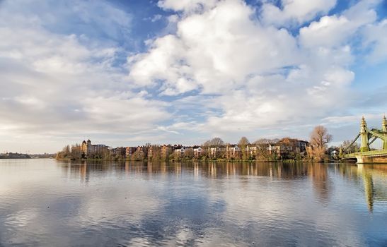 Hammersmith Bridge and south riverside of Thames London