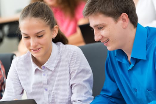 portrait of students in the classroom, teaching at the University of