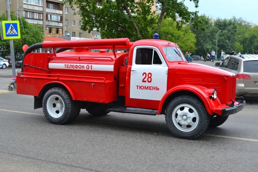 The fire truck on the city street