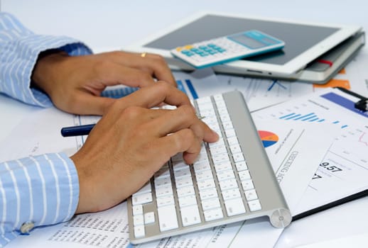 Business documents and pen placed on desks.