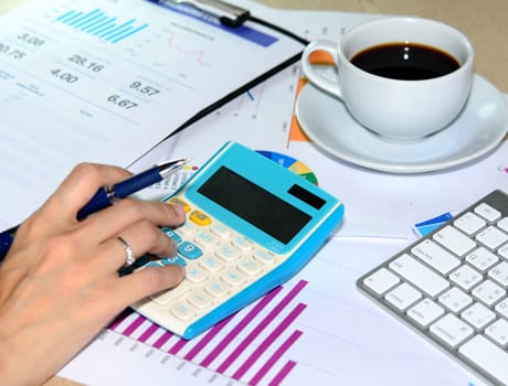 Business documents and keyboard placed on desks.