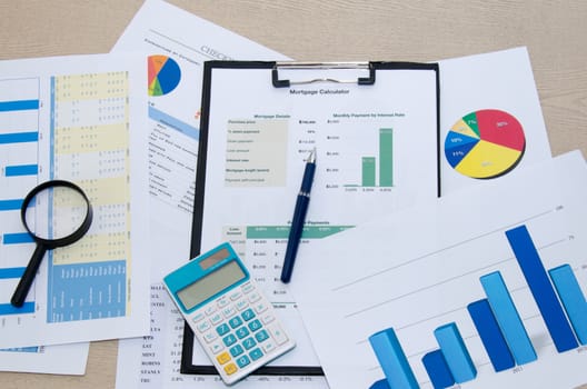 Business documents and keyboard placed on desks.