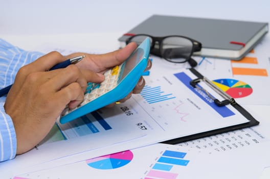 Business documents and keyboard placed on desks.