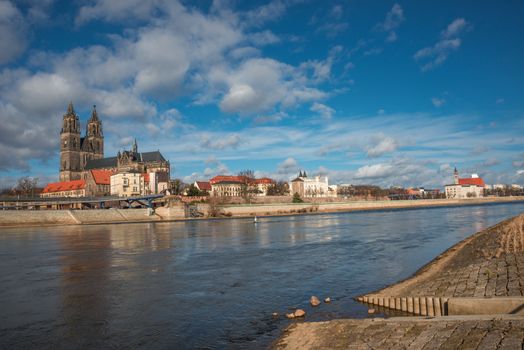 Magnificent Cathedral of Magdeburg at river Elbe with blue sky, Germany, 2014