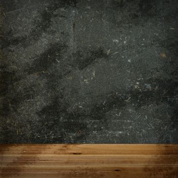 Wooden floor and concrete wall. The background in grunge style