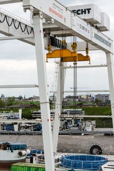 STUTTGART, GERMANY - April 20, 2014: Construction site of the Stuttgart21 (S21) railway project with huge tunnel drilling machinery by specialized company Herrenknecht on April 20, 2014 in Stuttgart, Germany. S21 is one of the most expensive and controversial railway projects ever with regular demonstrations against the plans to move the existing station underground going on.