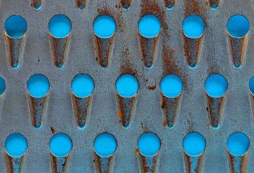 Abstract background of old perforated metal grater