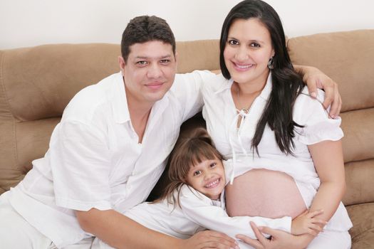 Hispanic family expecting new baby