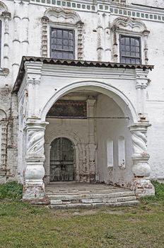 Stone porch of ancient church of St. Dmitry Solun in Dymkovo village, Veliky Ustyug, North Russia