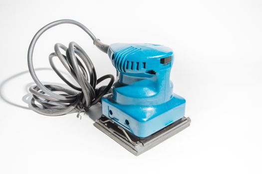 electric orbital sander, construction equipment on white background