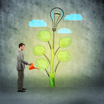 image of a businessman with a watering can