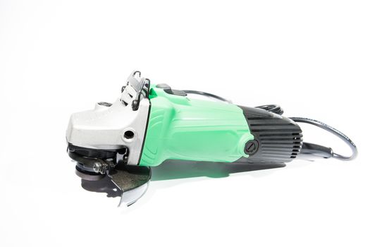 Electric grinder on white background