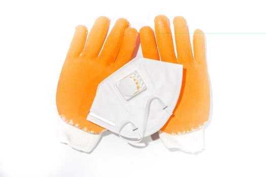 Gloves and a dust mask Construction on white background