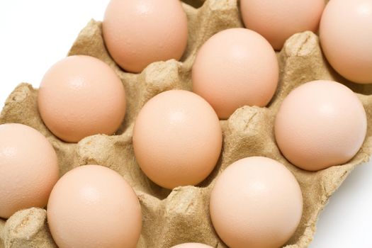 Dozen eggs isolated on white background