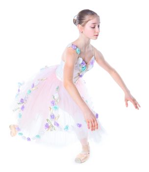 Beautiful young ballerina on a white background