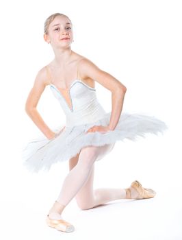 Beautiful young ballerina on a white background