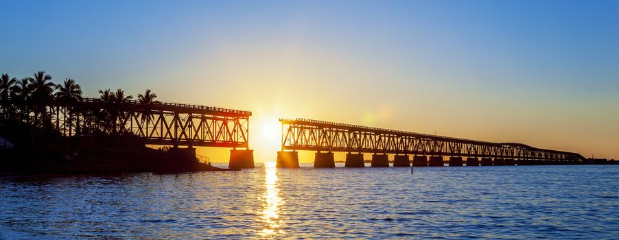 Colorful sunset with famous broken bridge, Key West, panoramic view