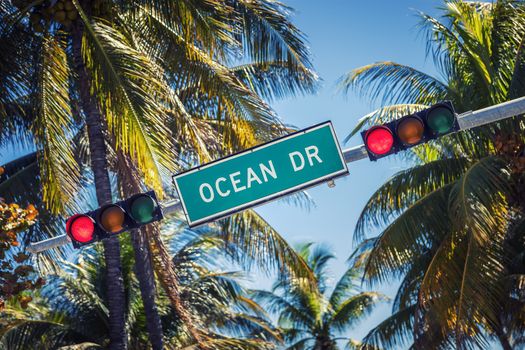 Famous street sign of Ocean Drive in Miami South with traffic light 