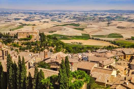 Landscape view of Montalcino town, fields and meadows, Tuscany, Italy