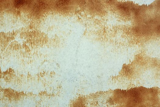 Painted metal surface with rusty abstract stains as a texture