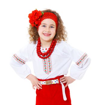 A little girl in Ukrainian national dress on the white background