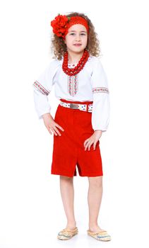 A little girl in Ukrainian national dress on the white background