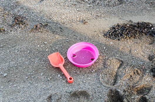 beach toys an early spring day on the water